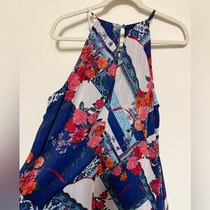 NWOT! Silky halter dress. New, never used. No tags. Shimmery subtle threads